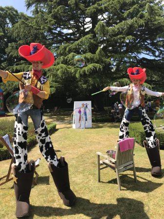cowboy-stilt-walkers-gravitylive-2-scaled-2.jpg